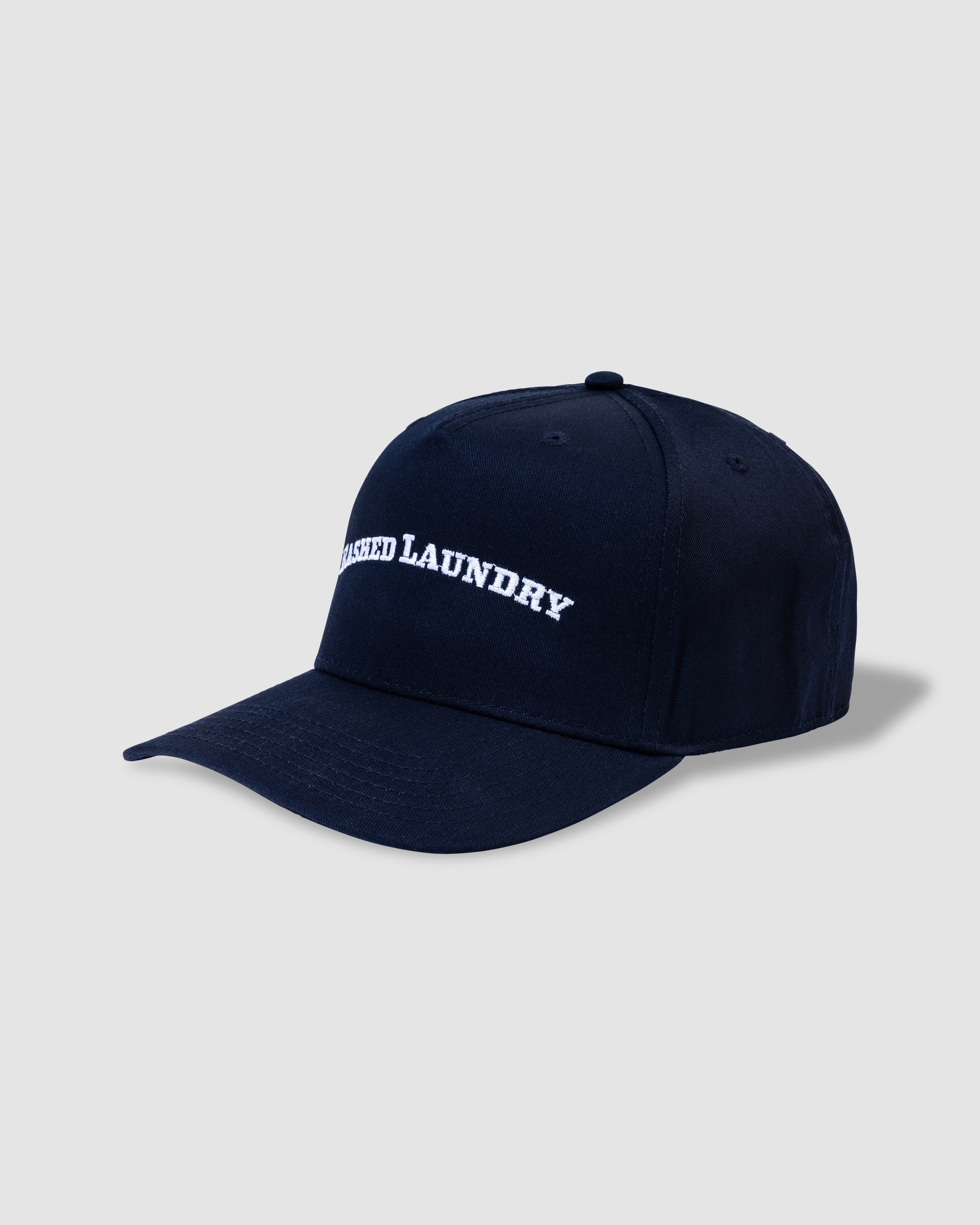 Men’s and unisex ink blue trucker hat with Bashed Laundry embroidery, front view